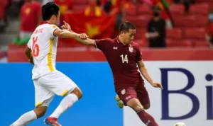 Leg kedua semifinal Piala AFF 2020 Timnas Thailand lawan Timnas Vietnam di National Stadium Singapura, Minggu (26/12/2021) malam. (Foto: Roslan RAHMAN/AFP)