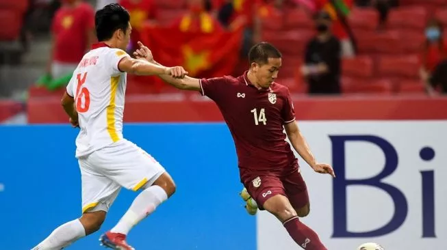 Leg kedua semifinal Piala AFF 2020 Timnas Thailand lawan Timnas Vietnam di National Stadium Singapura, Minggu (26/12/2021) malam. (Foto: Roslan RAHMAN/AFP)