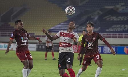 Madura United dan Borneo FC bermain imbang. (Foto: Antara)