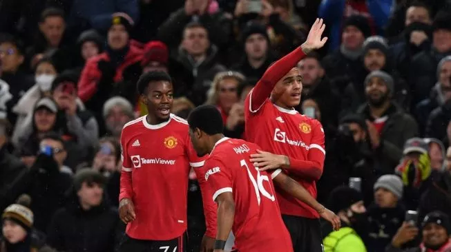 Striker Manchester United asal Inggris Mason Greenwood dan rekan-rekannya. (Foto: Suara.com)